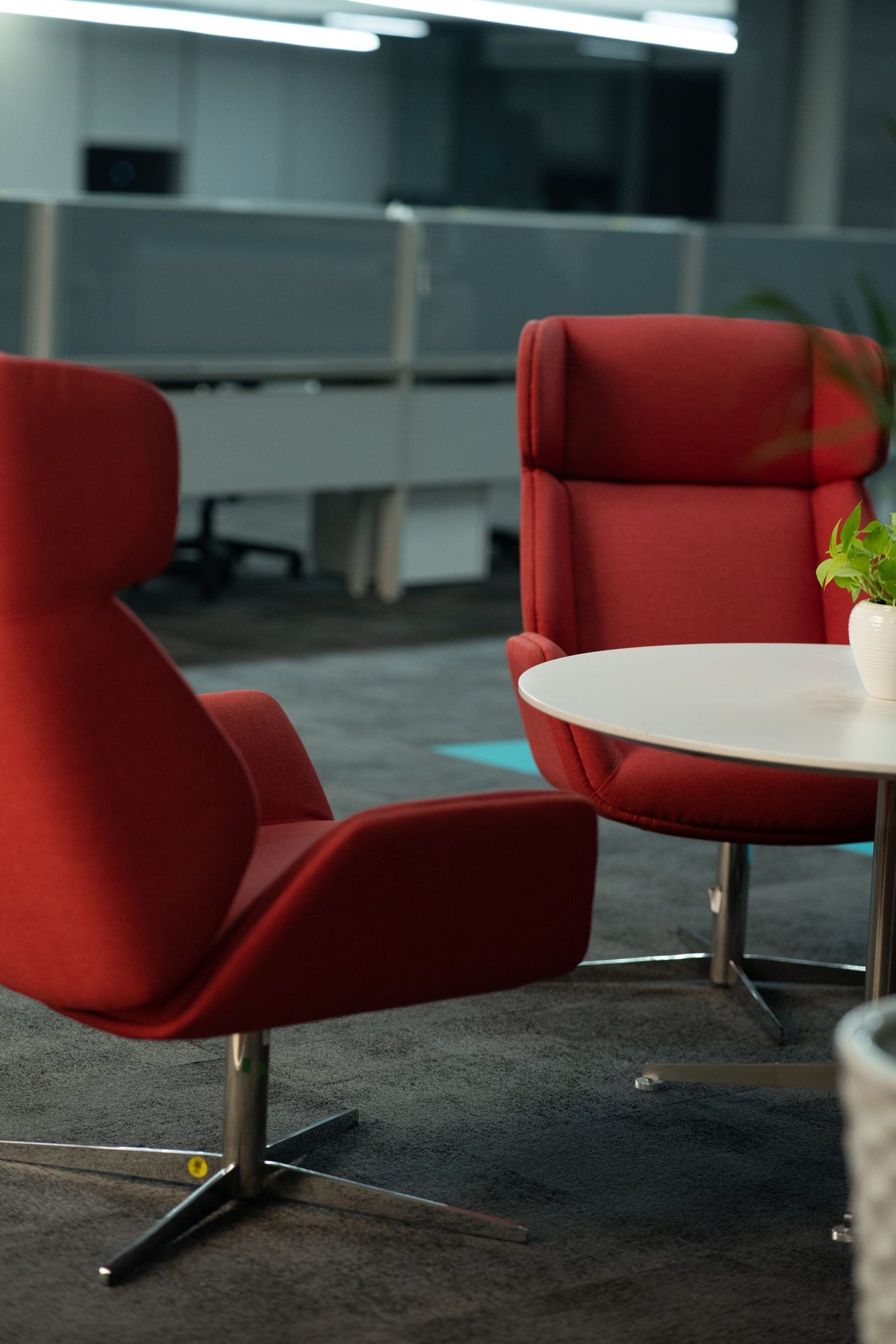 Armchairs around a small meeting table
