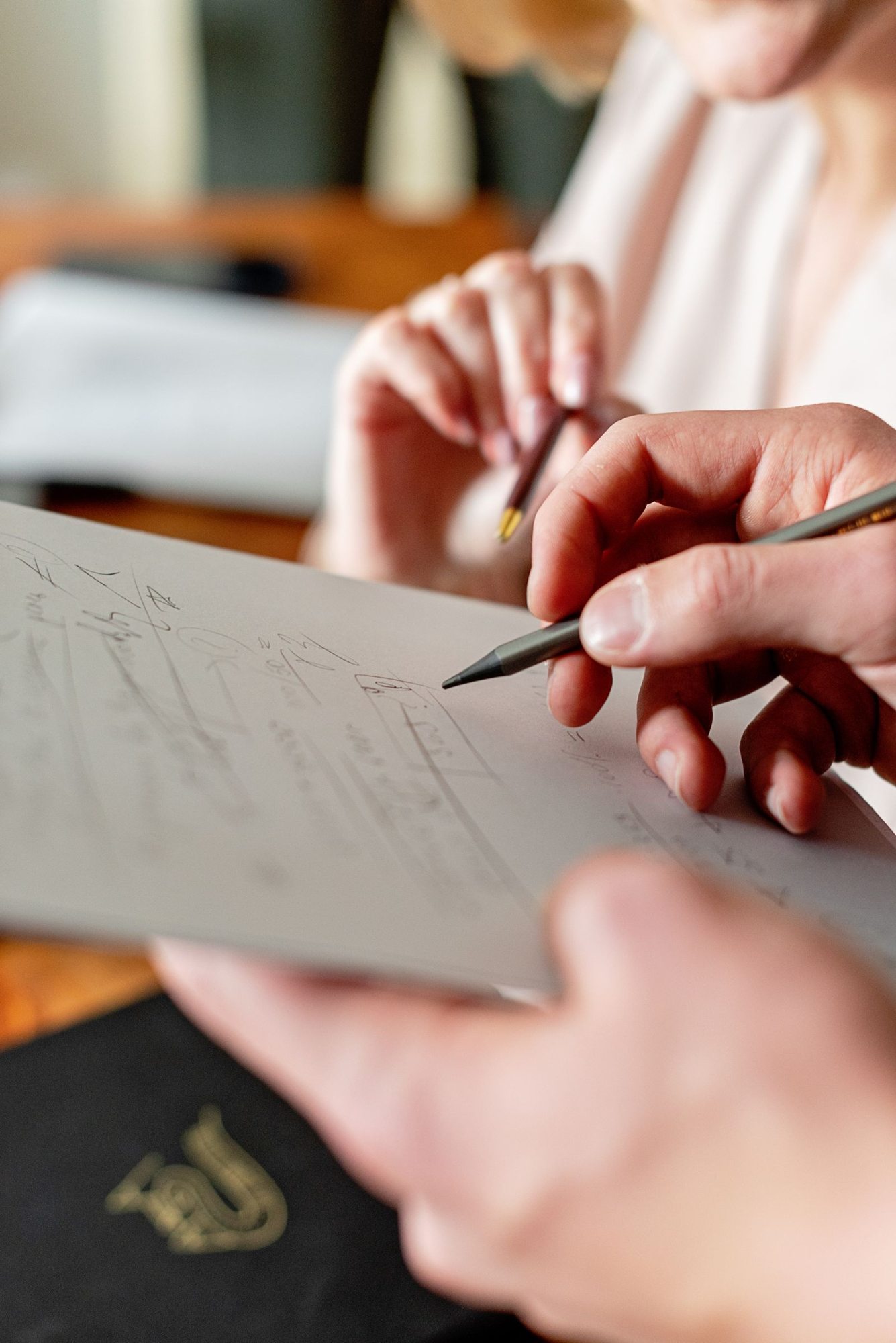 Handwritten notes during a discussion