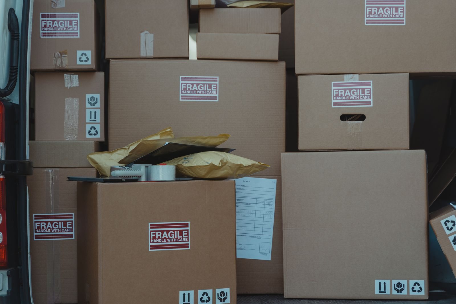 Stacked boxes labeled for fragile contents