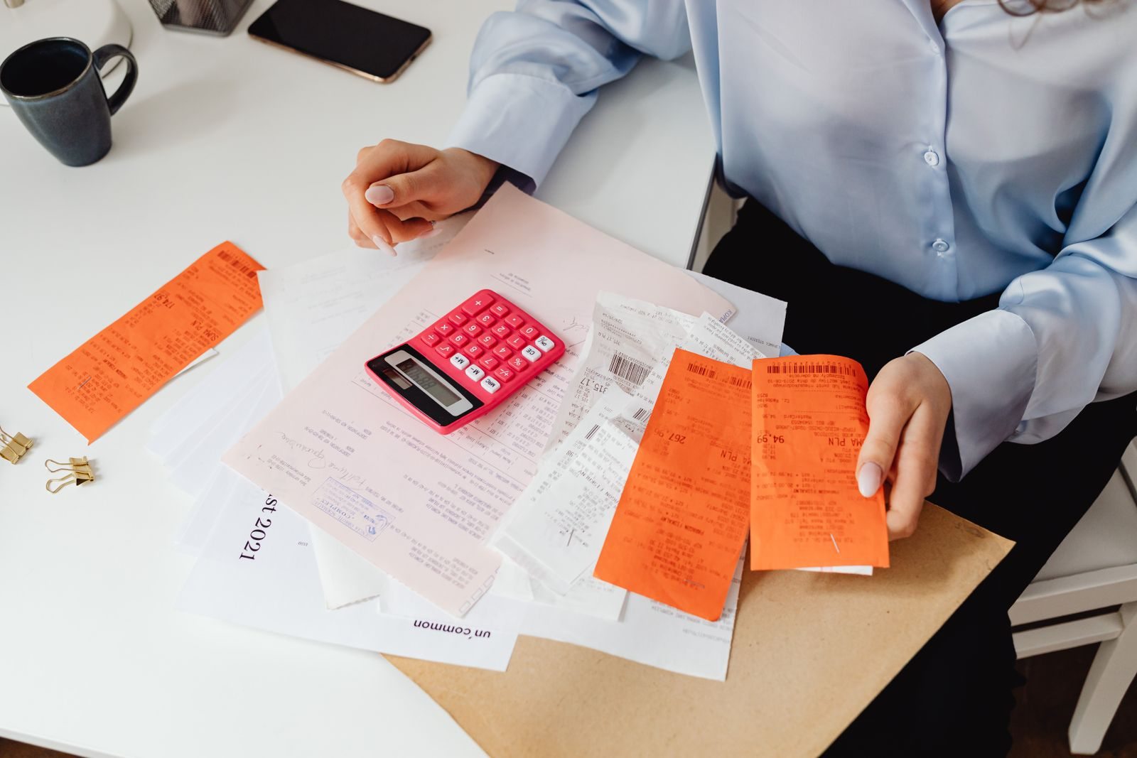 Receipts and a calculator during expense review