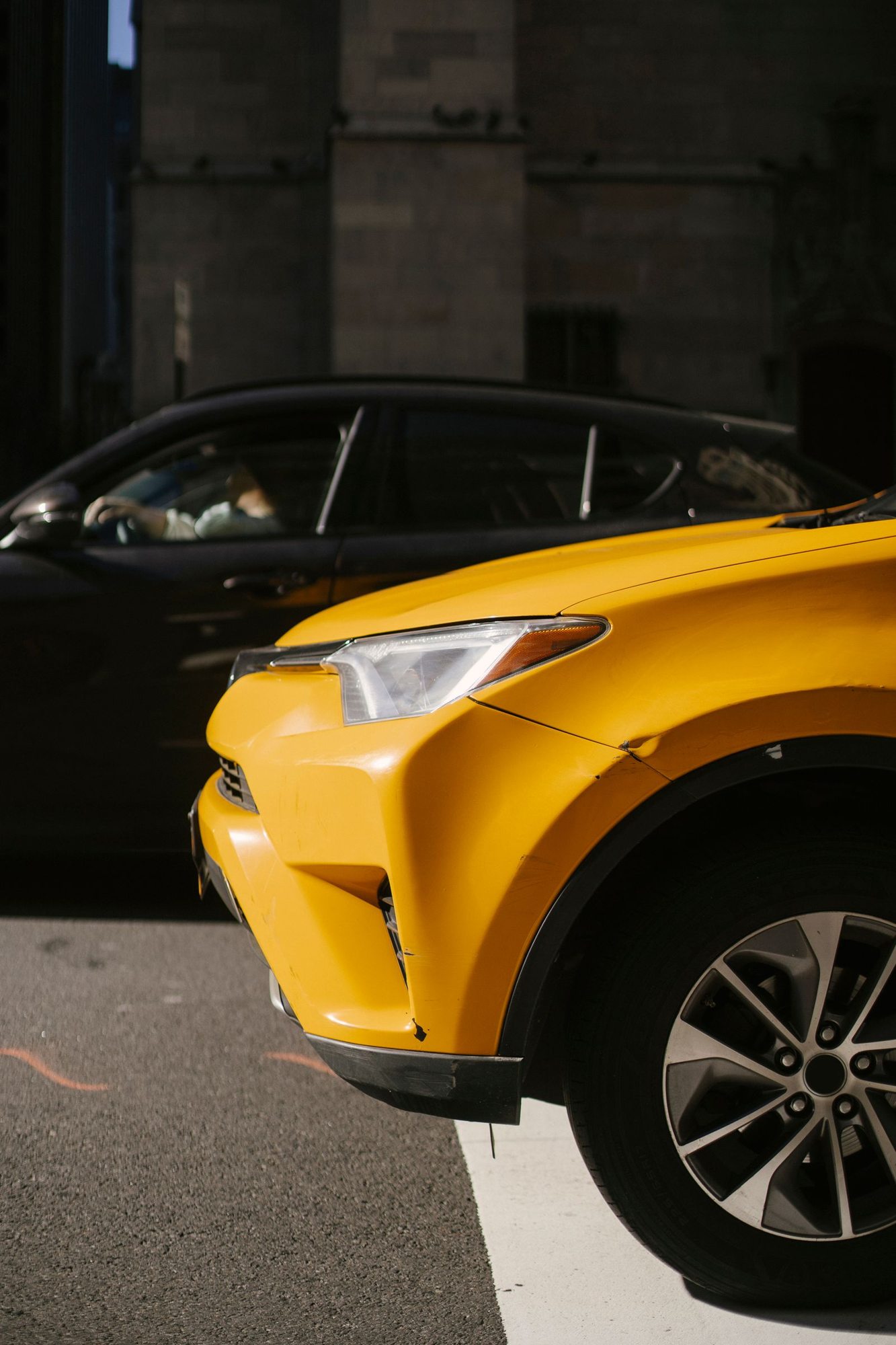 Taxi parked beside a street