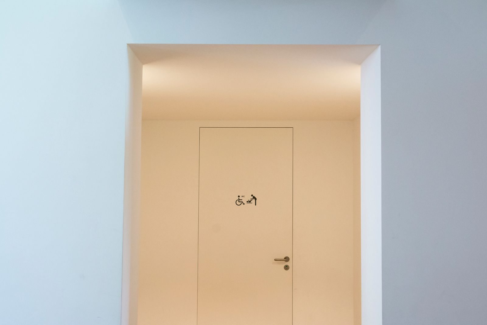Door marked for an accessible restroom