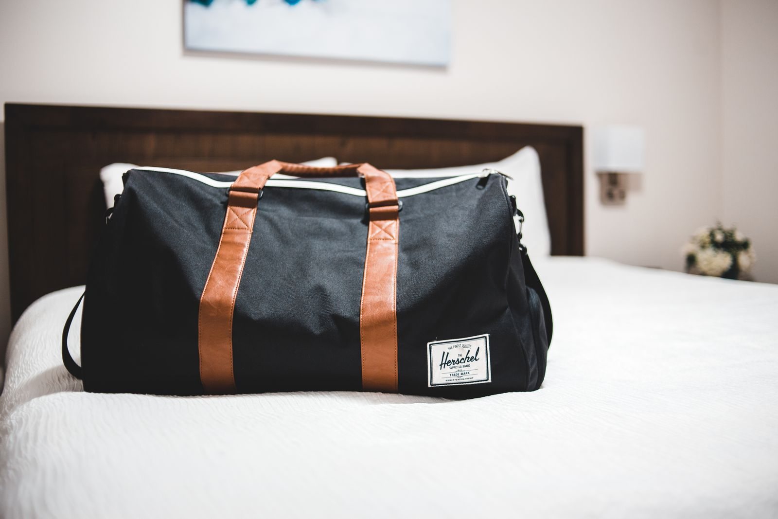 Travel bag on a hotel bed