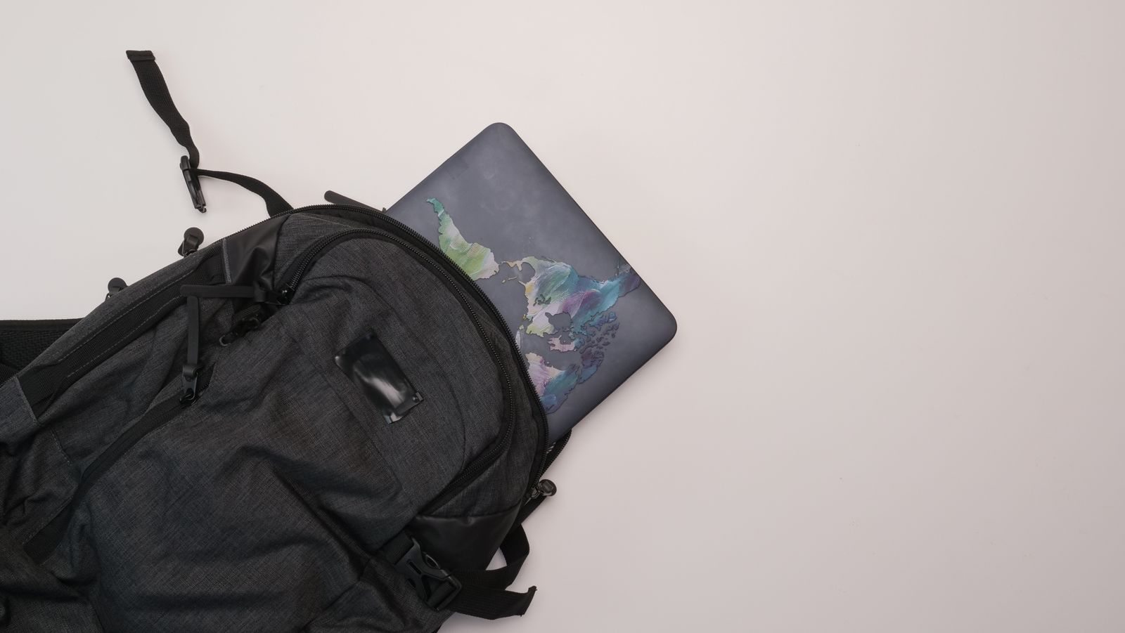 Laptop inside an open backpack