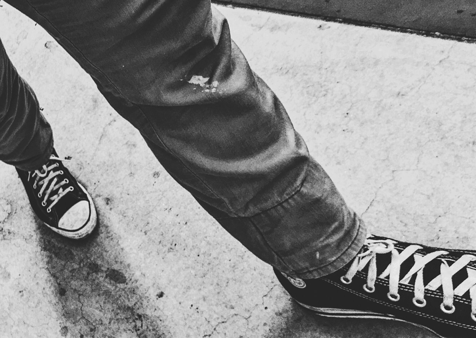 Laced casual shoes while walking