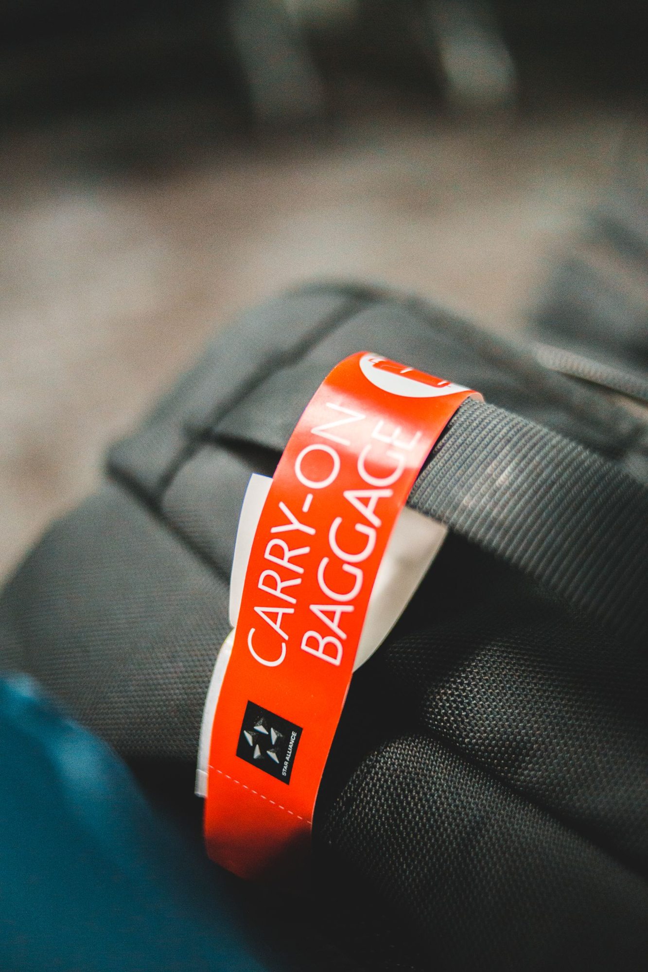Carry-on luggage tag attached to a travel bag