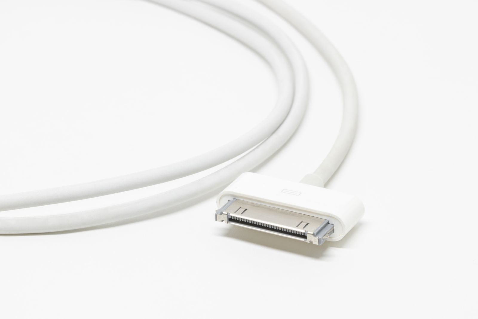 Close-up of a white charging cable