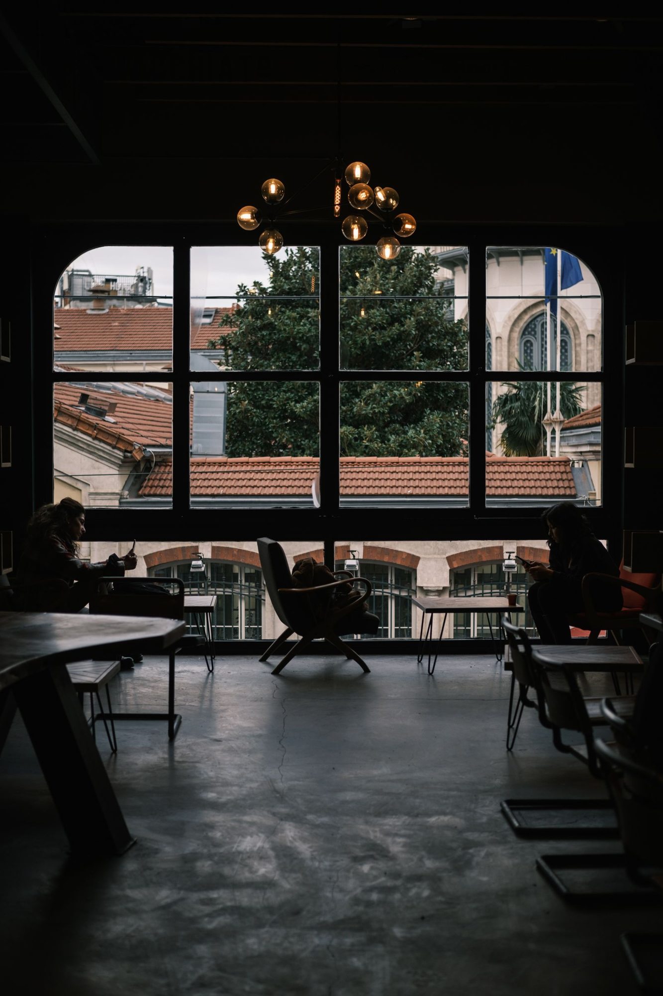 Café seating beside a large window